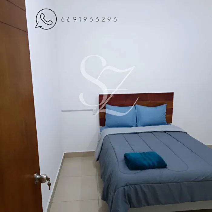 Habitación de Casa Vacacional Doble Z en Mazatlán, con cama matrimonial y ambiente acogedor.